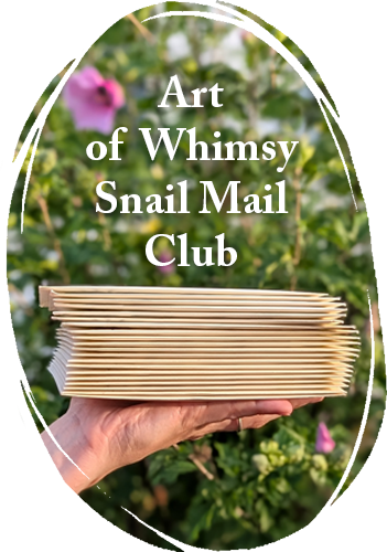 A stack of envelopes in front of a green nature background. Text says "Art of Whimsy Snail Mail Club." It links to the art of whimsy snail mail club.